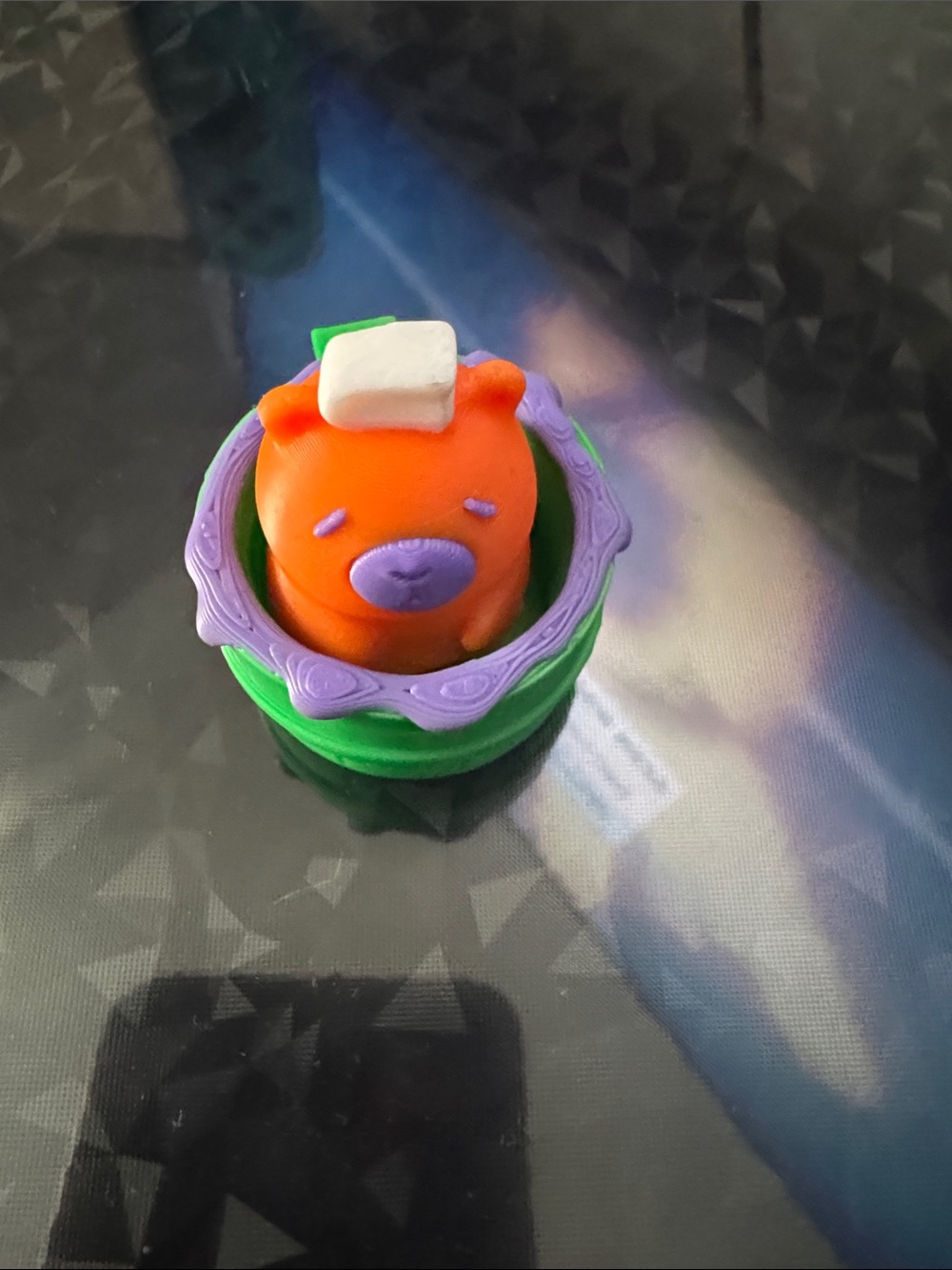 Orange capibara  Stackable Bath Toy with Purple and Green Base
